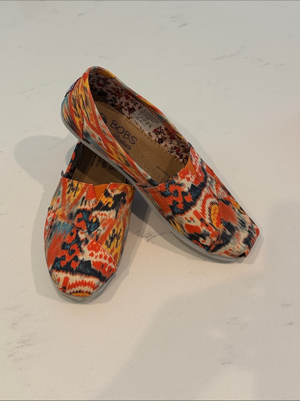 BOBS from Skechers Orange, Blue & Yellow Ikat Slip-On Flats